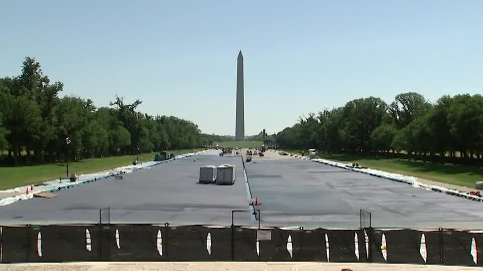Crews paint DC Reflecting Pool blue as Trump renovation continues | Reuters