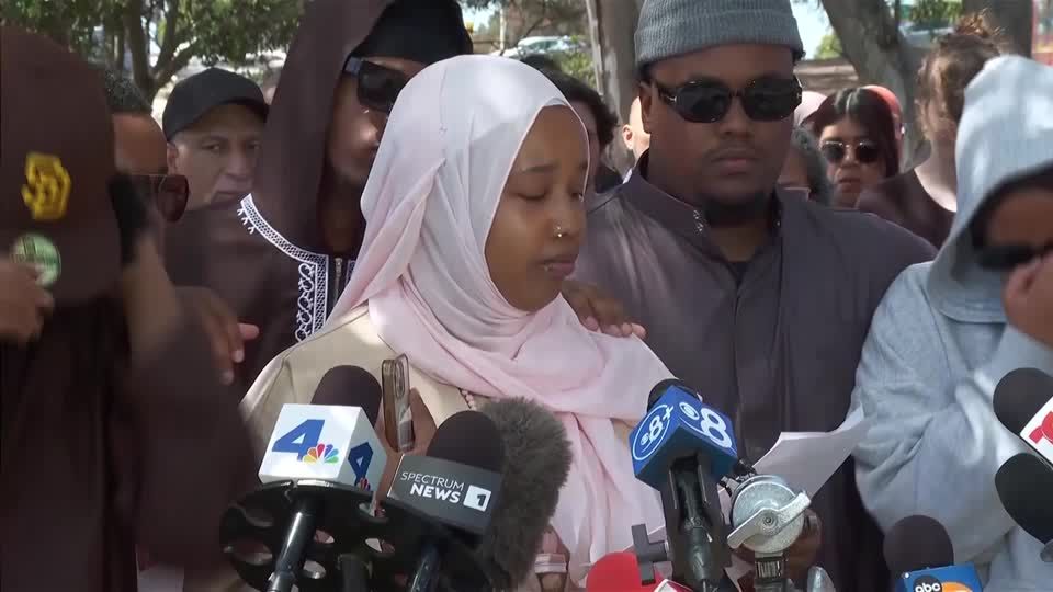 Daughter of slain mosque security guard honors 'loving father' | Reuters