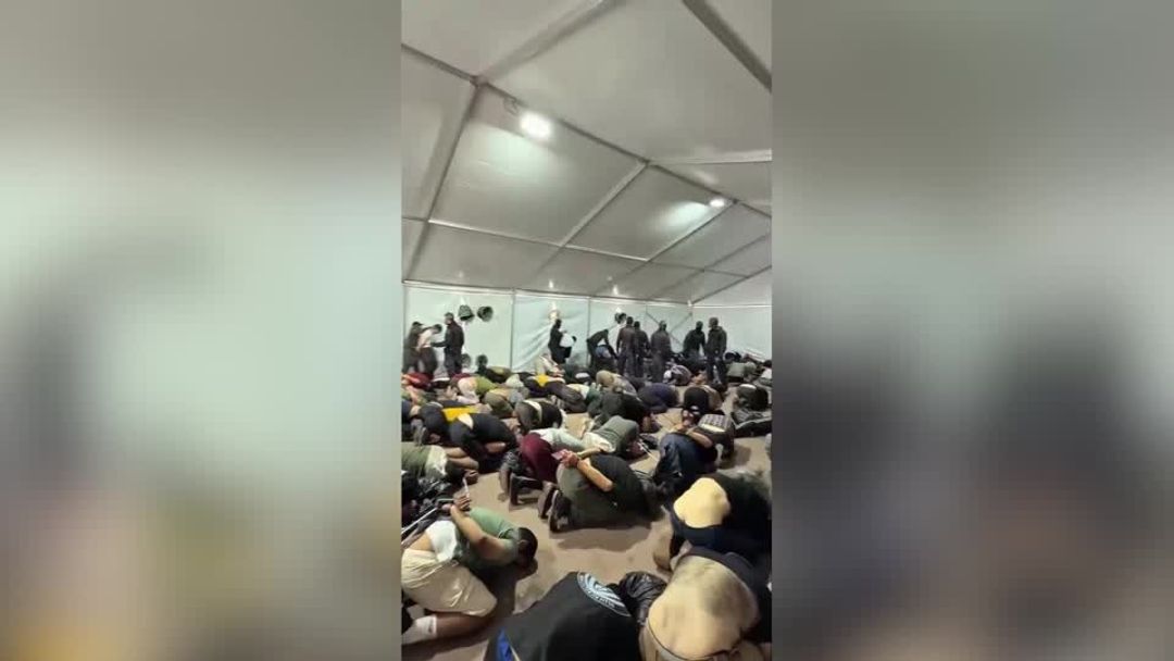 Israeli police force Gaza flotilla activists to kneel with hands bound ...
