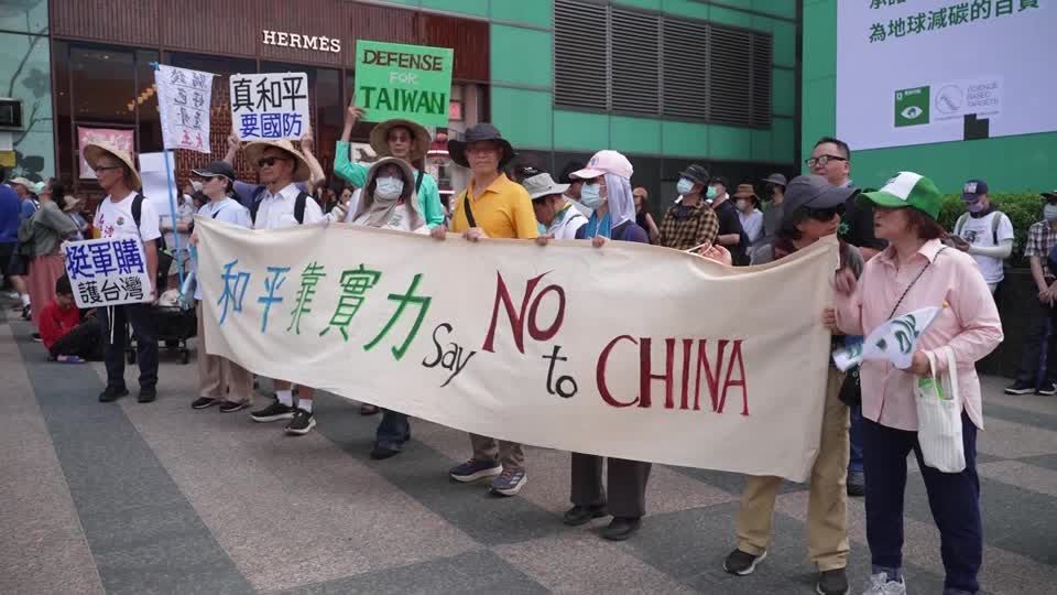 Protests in Taipei after parliament limits defense spending | Reuters