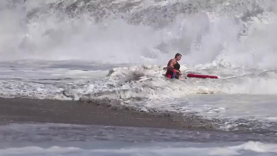 California lifeguard breaks down dramatic rescue caught on camera | Reuters