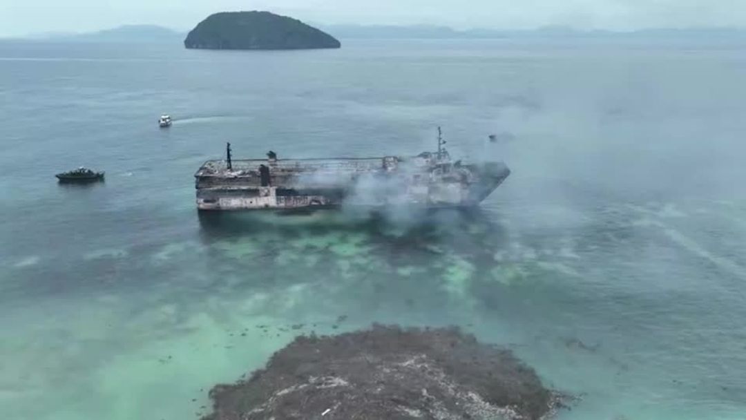 Philippine ferry fire kills at least five and leaves dozens missing