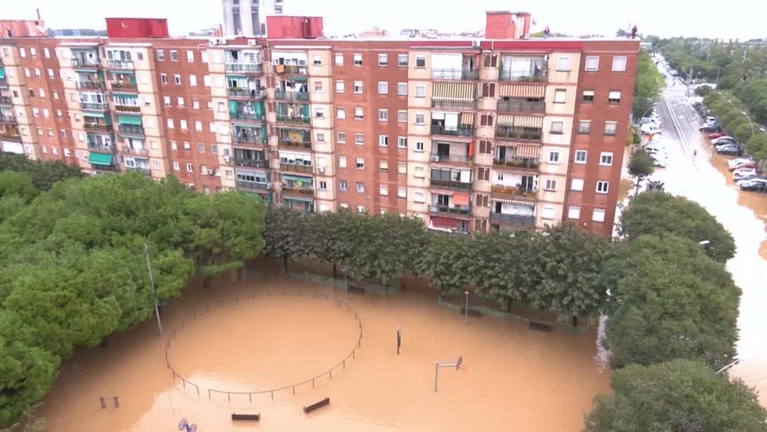Heavy rains flood streets and submerge cars in Spain's Catalonia | Reuters