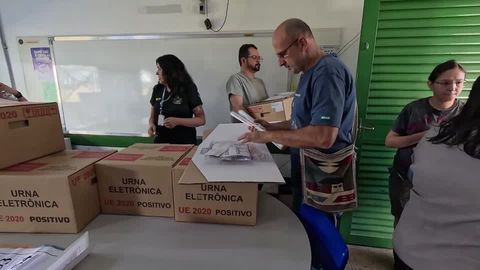 Electoral workers prepare for Brazil's tense presidential runoff | Reuters